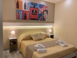 Postel nebo postele na pokoji v ubytování B&B In Centro