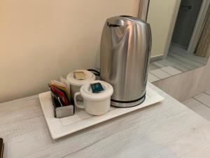 Příslušenství pro přípravu čaje a kávy v ubytování B&B In Centro