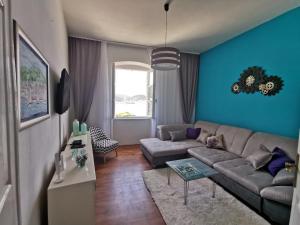 TV a/nebo společenská místnost v ubytování Apartman nono Ive