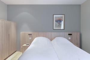 Postelja oz. postelje v sobi nastanitve B&B 't Withuis