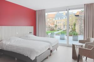 Postelja oz. postelje v sobi nastanitve B&B 't Withuis