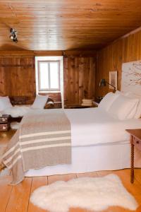 Postel nebo postele na pokoji v ubytování Le Vieux Presbytère