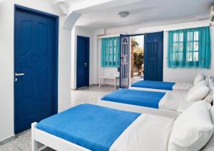 Roula Villa Studios & Apartments客房内的一张或多张床位