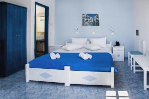 Roula Villa Studios & Apartments客房内的一张或多张床位