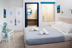 Roula Villa Studios & Apartments客房内的一张或多张床位