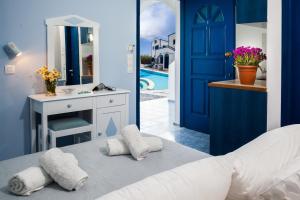Roula Villa Studios & Apartments客房内的一张或多张床位