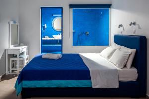 Roula Villa Studios & Apartments客房内的一张或多张床位