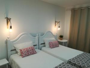 a bedroom with two beds with pillows on them at Ponte Romana in Silves +48 photos