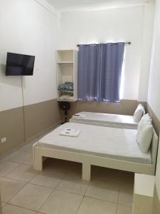 TV a/nebo společenská místnost v ubytování Hotel Aruba
