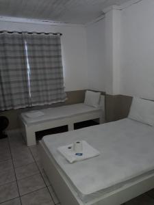 Cama o camas de una habitación en Hotel Aruba