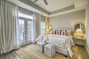 a bedroom with a bed and a large window at Downtown Retreat in Chattanooga
