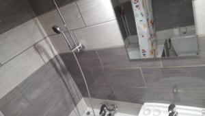 Koupelna v ubytování Hôtel Confort