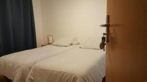 Postel nebo postele na pokoji v ubytování Hôtel Confort
