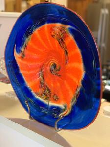 a blue and orange glass bowl sitting on a table at Barossa House in Tanunda