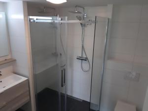 Koupelna v ubytování Iefjeshoeve + 25 fotografií