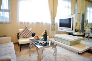 TV a/nebo společenská místnost v ubytování Regal Hongkong Hotel
