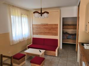 Posezení v ubytování Aqua Azur Apartman