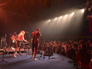 a group of people on a stage at a concert at Circus Fantasia in Rostock