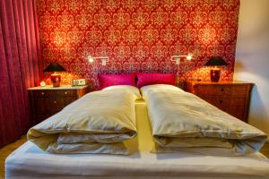 A bed or beds in a room at Ferienhaus Schils Zur alten Heidegärtnerei