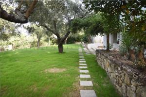 Zahrada ubytování Olivella Villas by Vatos + 11 fotografií