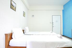 Ένα ή περισσότερα κρεβάτια σε δωμάτιο στο Fang villa mansion