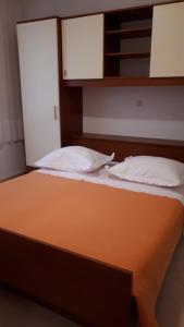 Postel nebo postele na pokoji v ubytování Apartman Štulić