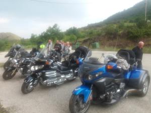 a group of motorcycles parked on the side of a road at Panorama Kakopleyri Kalabakas in Kakoplévrion