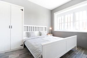Postel nebo postele na pokoji v ubytování Apartmány MALIK