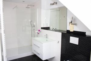 Ein Badezimmer in der Unterkunft Hotel Stern