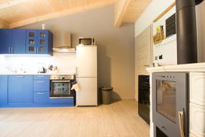 Kuchyň nebo kuchyňský kout v ubytování Apartmány MALIK