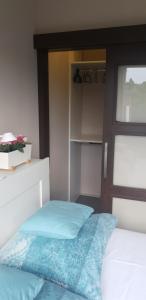 Posteľ alebo postele v izbe v ubytovaní Blue Ball Apartment
