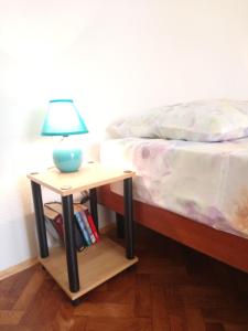 Ein Bett oder Betten in einem Zimmer der Unterkunft Charming Hill Apartment
