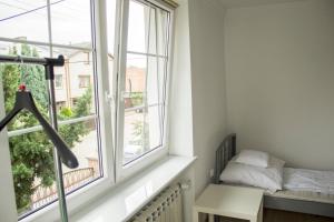 Posteľ alebo postele v izbe v ubytovaní Magic Garden Hostel