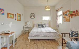 Ένα ή περισσότερα κρεβάτια σε δωμάτιο στο Remis villa