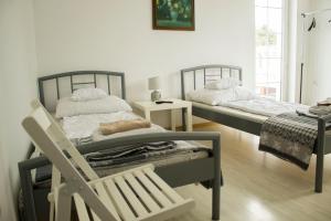 Posteľ alebo postele v izbe v ubytovaní Magic Garden Hostel
