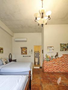 Ένα ή περισσότερα κρεβάτια σε δωμάτιο στο Remis villa