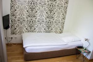 Ein Bett oder Betten in einem Zimmer der Unterkunft Hotel Stern