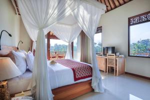 Postel nebo postele na pokoji v ubytování Nata Ubud + 37 fotografií