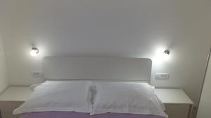 Posteľ alebo postele v izbe v ubytovaní Apartment Zaklopatica