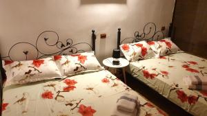 En eller flere senger på et rom på Porto Lima