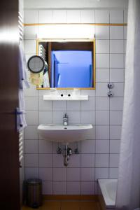 Ein Badezimmer in der Unterkunft Hotel Stern