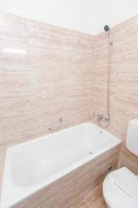 Koupelna v ubytování Hotel Mures