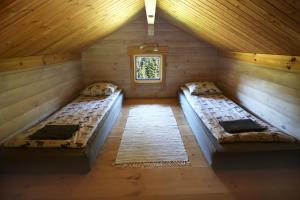 Cama o camas de una habitación en Viesu mājas Briedīši
