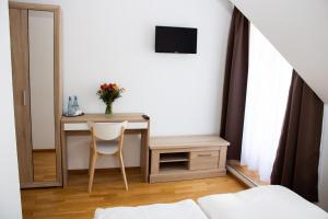 Ein Bett oder Betten in einem Zimmer der Unterkunft Hotel Stern