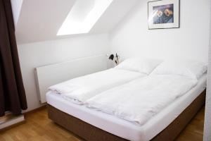Ein Bett oder Betten in einem Zimmer der Unterkunft Hotel Stern
