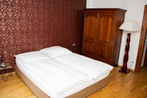 Ein Bett oder Betten in einem Zimmer der Unterkunft Hotel Stern
