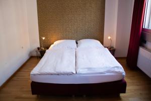 Ein Bett oder Betten in einem Zimmer der Unterkunft Hotel Stern