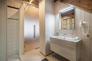 Kopalnica v nastanitvi Apartmány Šupina