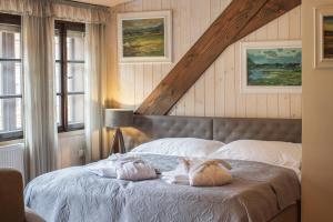 Postelja oz. postelje v sobi nastanitve Apartmány Šupina