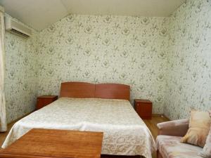 Cama o camas de una habitación en Gostevoy Dom Mir